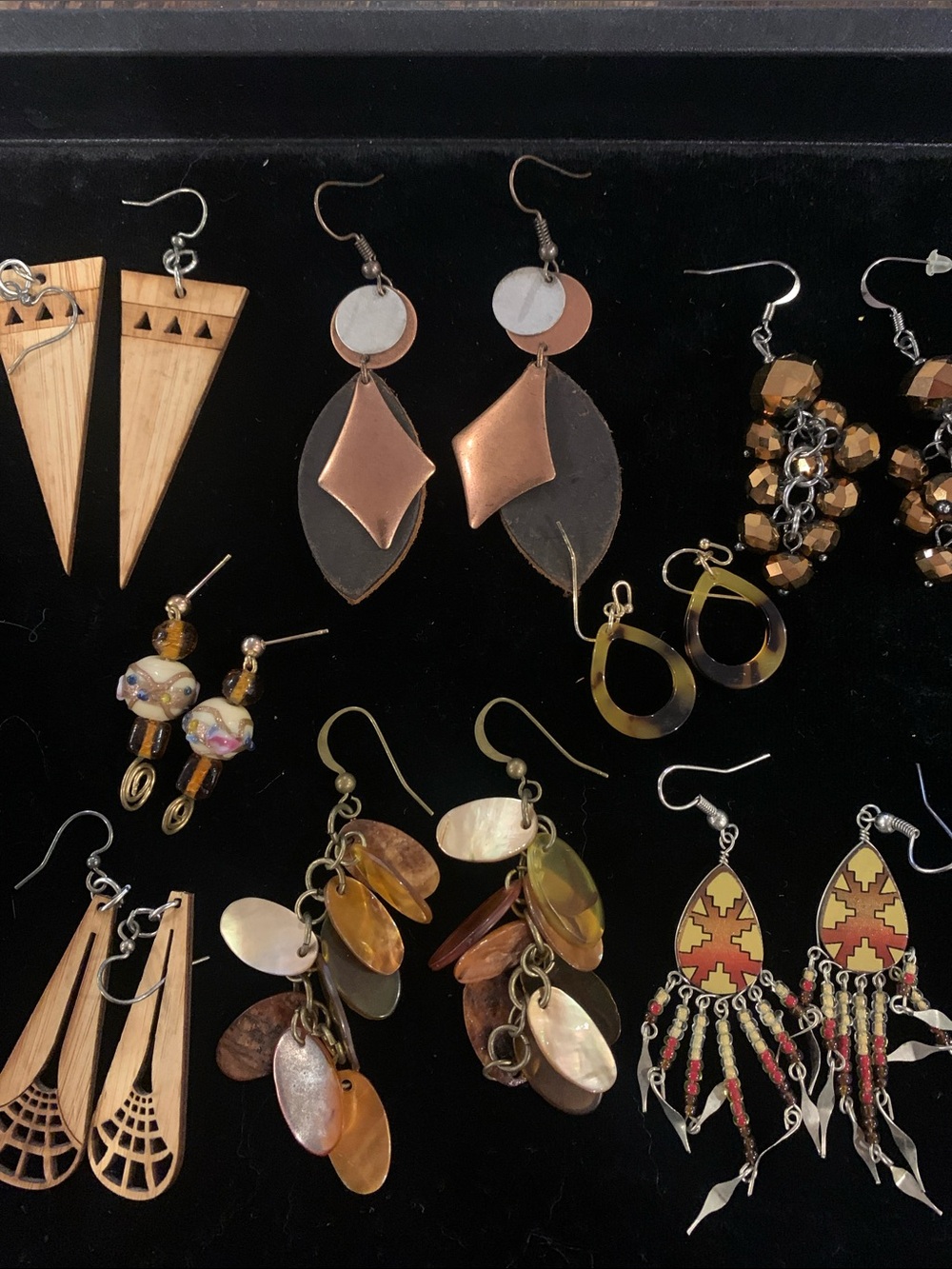 A collection of Copper and Brown Dangle Earrings - Women Jewelry